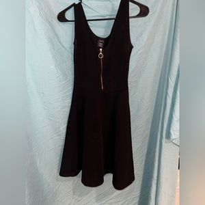 Black dress with gold zipper in front